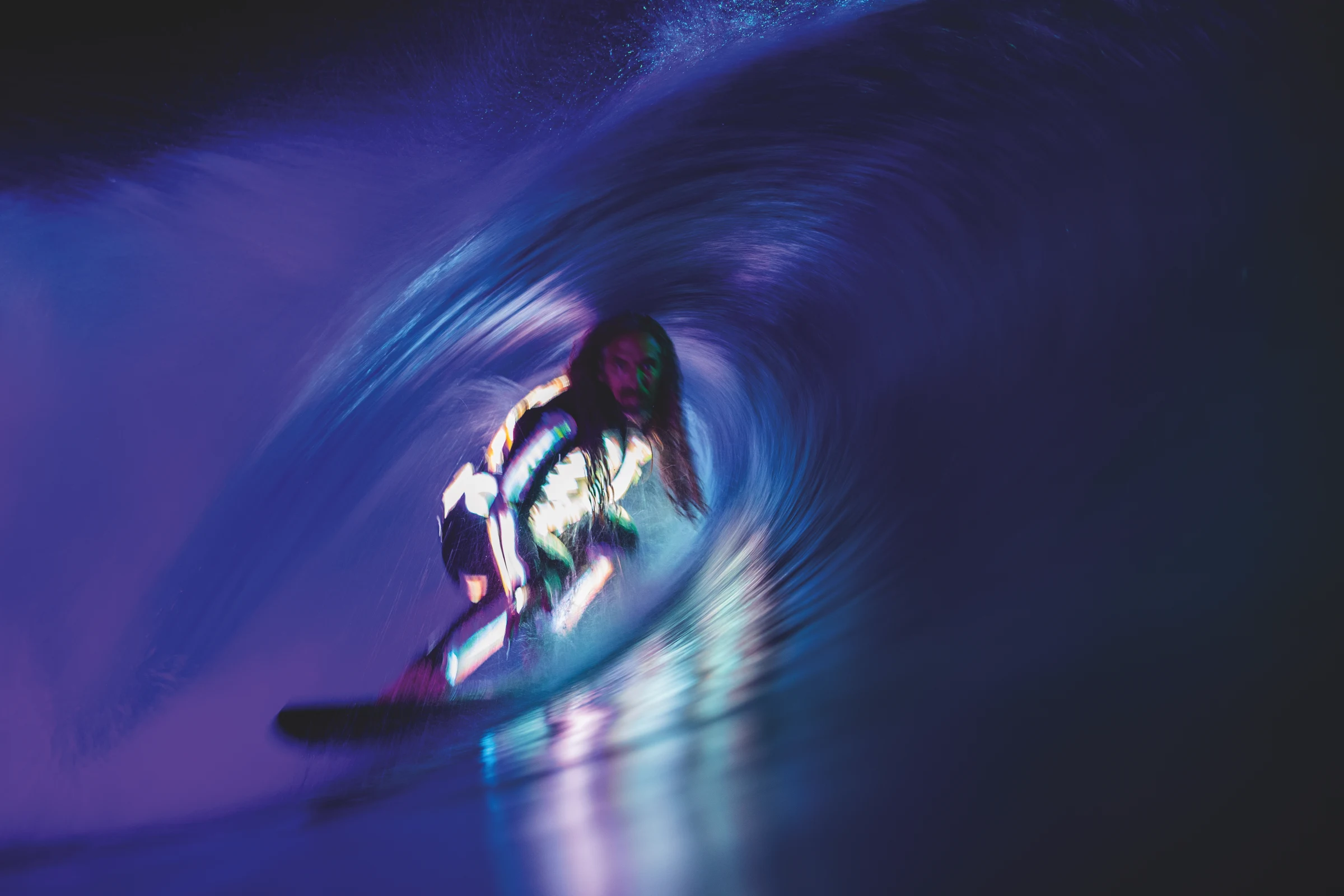 Rob Machado surfing at night in Mountains of the Moon. Photo: Glaser.